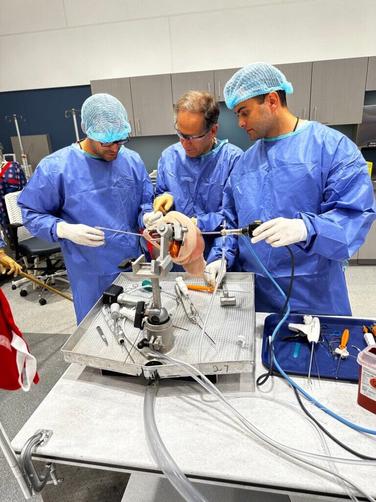 dr. kevin plancher applying robot assisted surgery